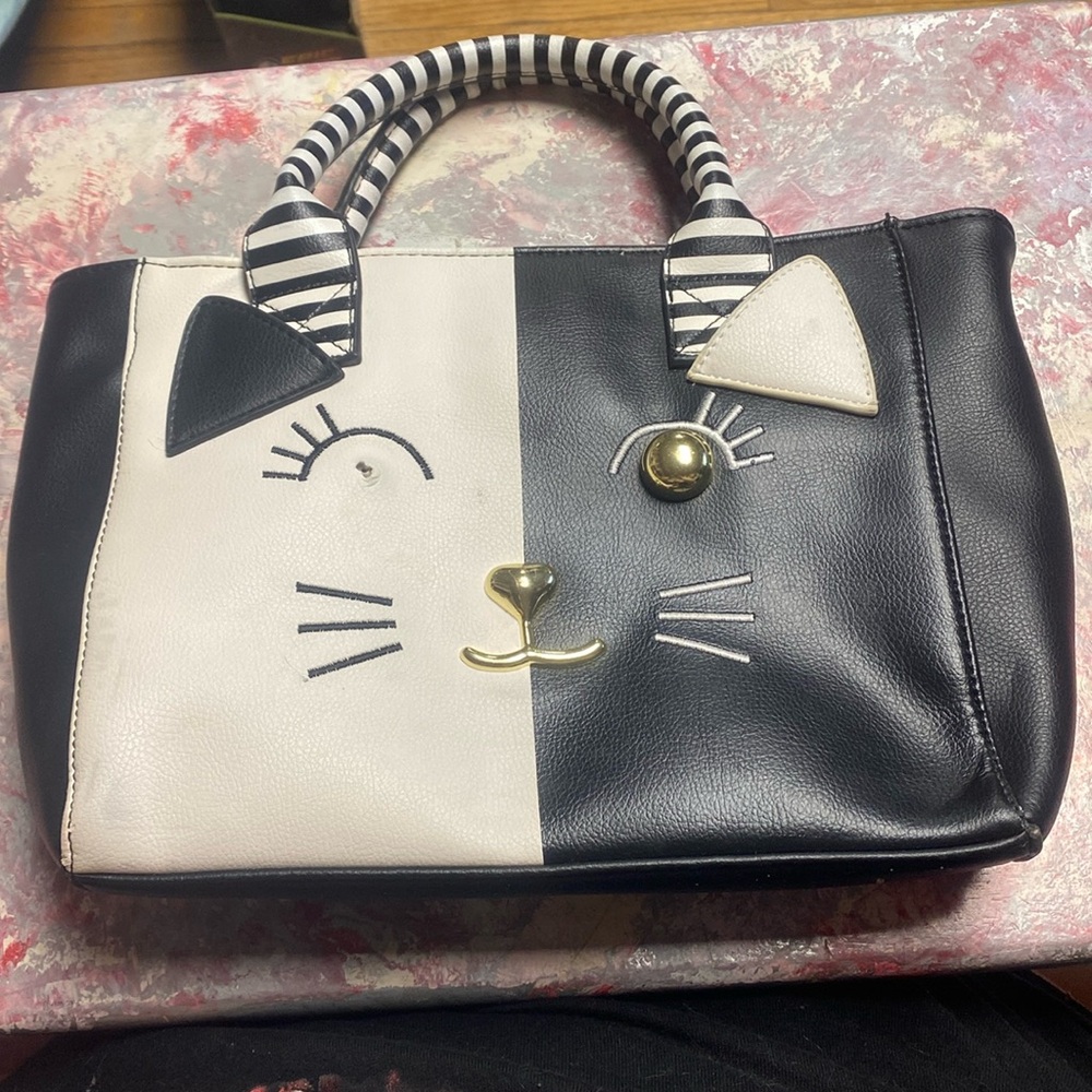 Betsy Johnson woman’s purse cross body